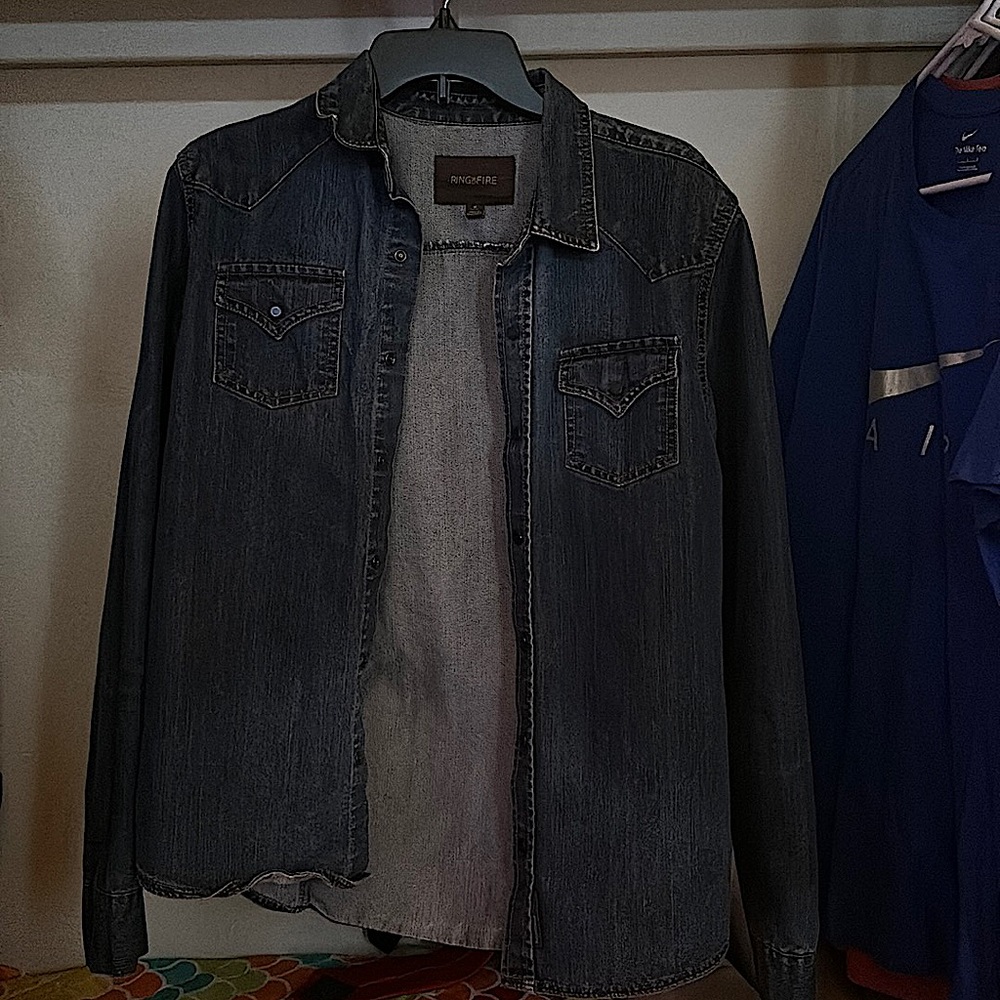Ring of Fire Jean jacket. No rips or tears.